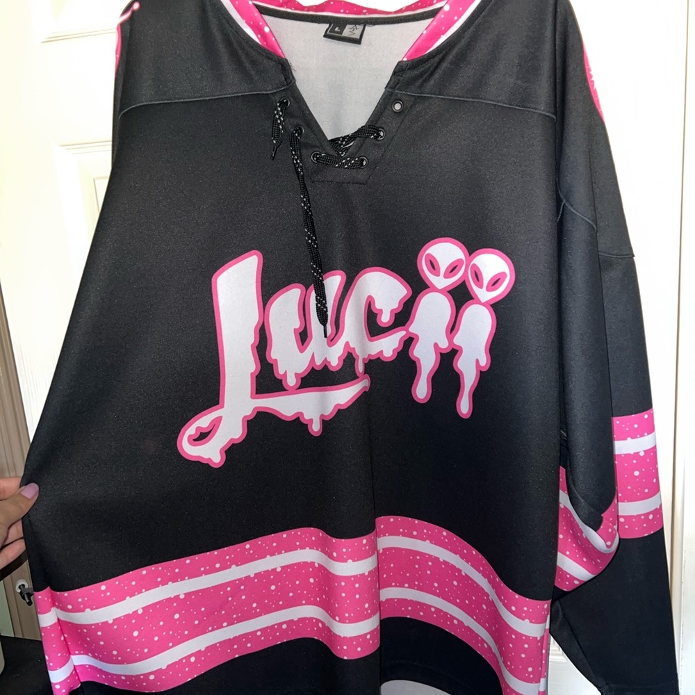 Black and pink Lucii hockey jersey
